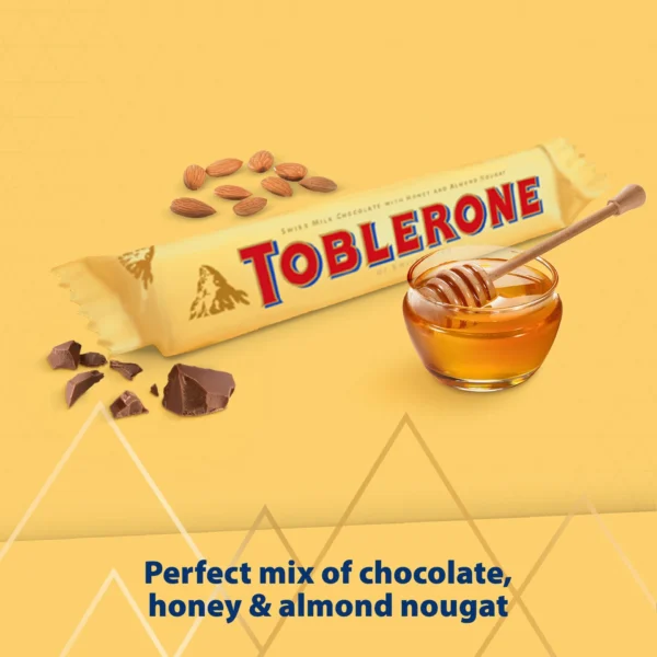 505e4d46-17cf-42bc-8c9a-6a0cedbddfcb_size1920_cropCenter Toblerone Swiss Milk Chocolate Bar with Honey and Almond Nougat 50 g